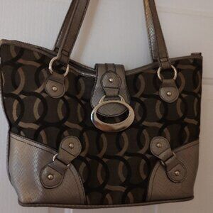 Purse with no Brand Tag. Clean inside and out. Never used.